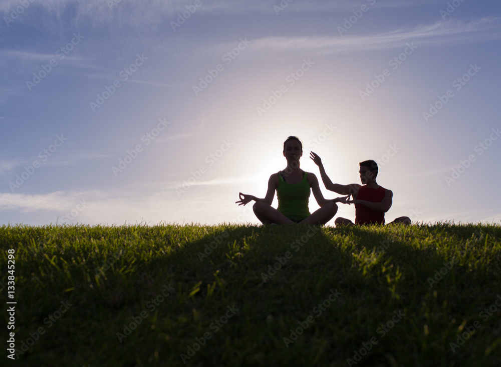 Yoga and meditation. Young couple relax the mind body a spirit.