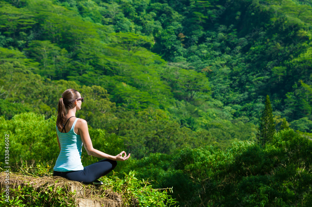 Woman Meditating In Nature