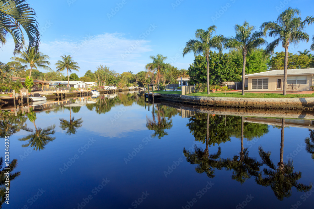 Good morning Florida, an idyllic place, water, palms und blue sky. Good morning Florida, an idyllic place, water, palms und blue sky.