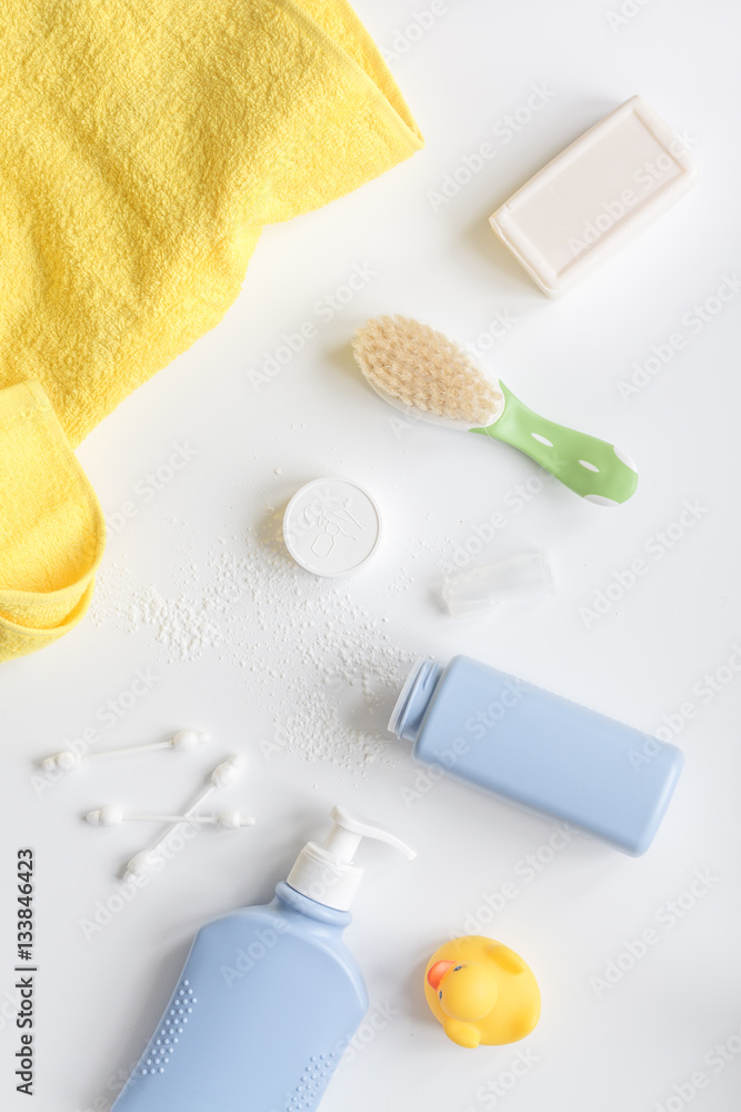 baby accessories for bath with duck on white background baby accessories for bath with duck on white background
