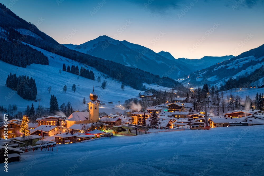 Fototapeta premium View over Saalbach mountain village at night, Salzburg, Austria