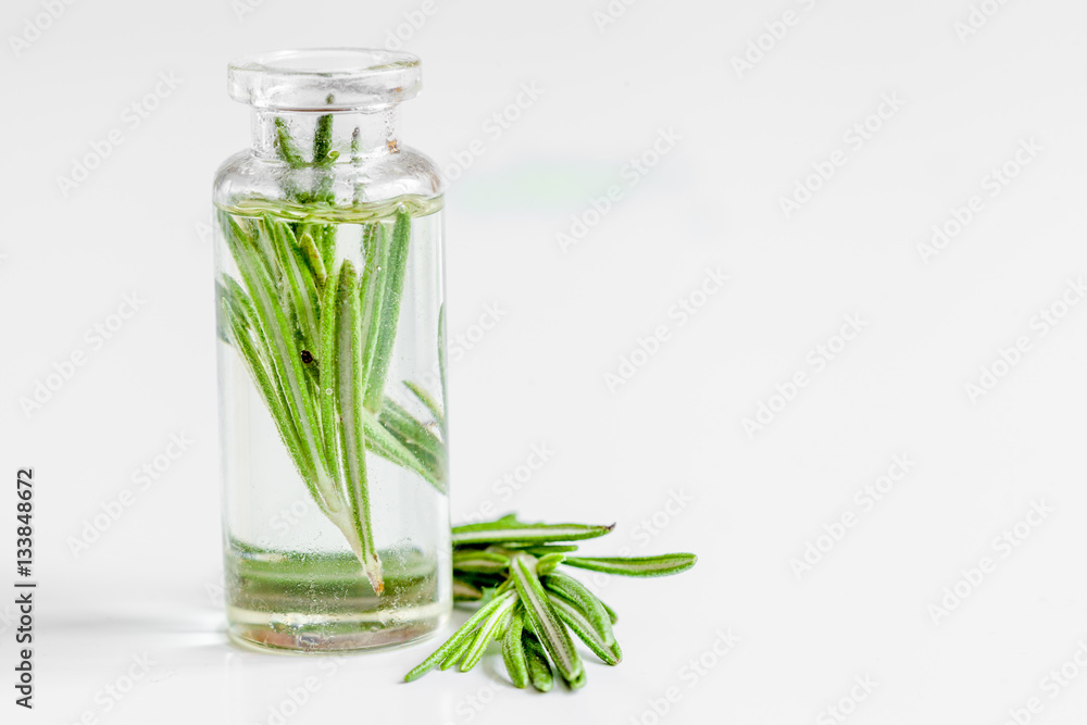 organic cosmetics with extracts of herbs rosemary on white background organic cosmetics with extracts of herbs rosemary on white background