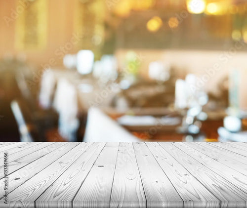 wood table top on blurred o...