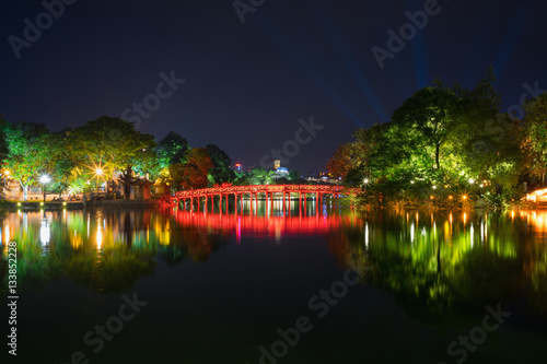 Hoan Kiem lake at night with old The Huc bridge on national celebration day © Hanoi Photography