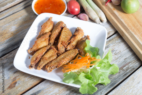 Chicken wings, fried foods (Thailand).
