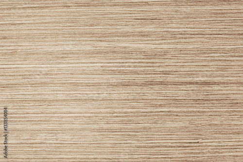 White plywood plank floor texture background. Grey tabletop pastel above oak timber. Dirty wooden surface tree light wall and board grain. Brown desk painted panel pattern. Material cracked vintage.