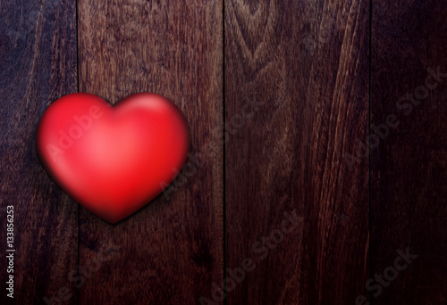 Red Heart Shape 3d over Wooden Background