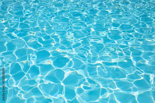 Blue water surface and ripple wave in pool