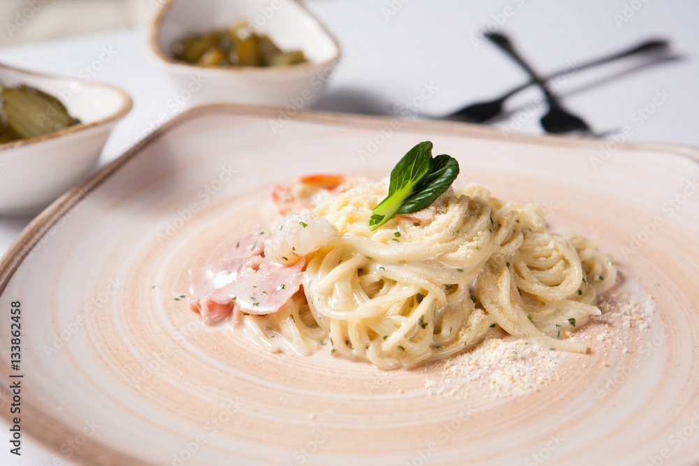 Spaghetti alla Carbonara on table Spaghetti alla Carbonara on table