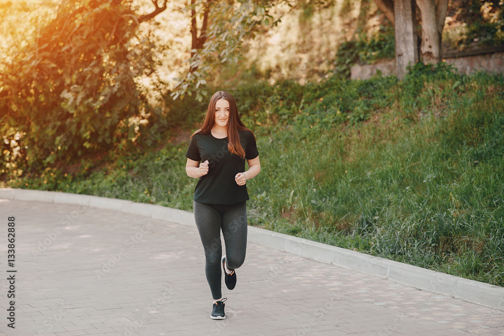 Fototapeta premium Fitness girl on a walk