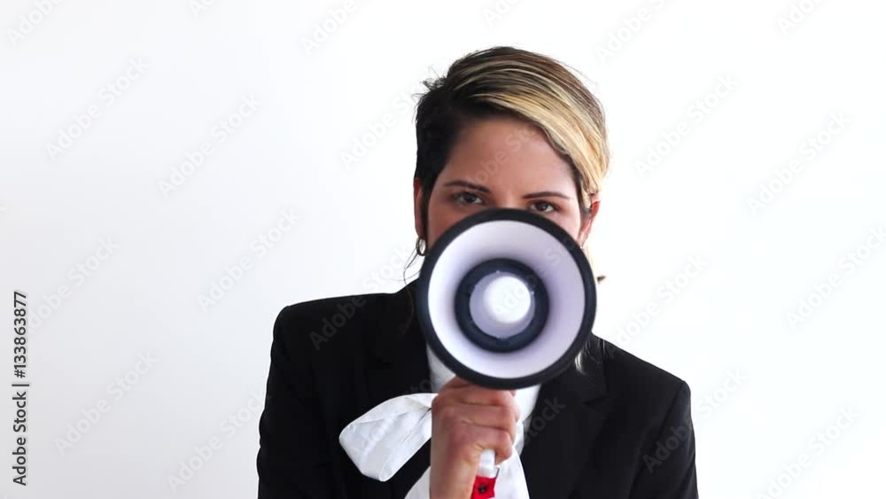 Buisness woman shout with loudspeaker side view Buisness woman shout with loudspeaker side view