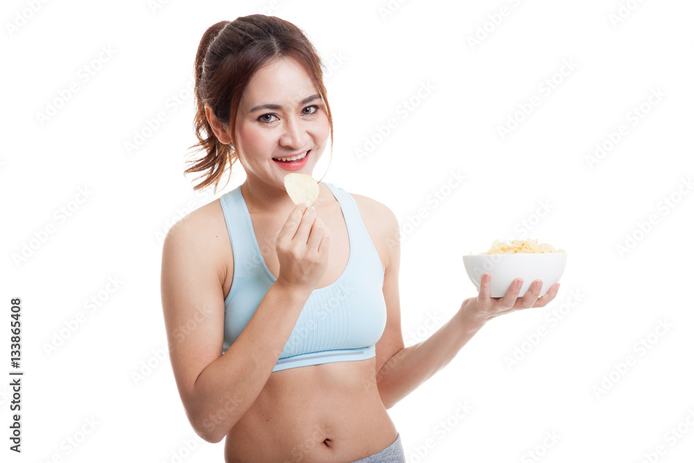 Beautiful Asian healthy girl eat potato chips. Beautiful Asian healthy girl eat potato chips.
