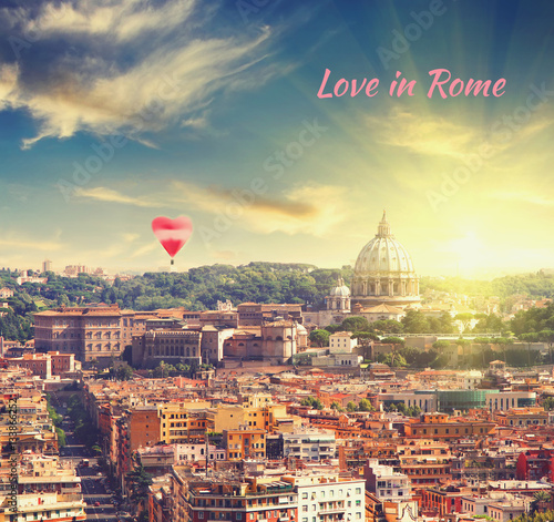 Happy Valentine's Day! Aerial View of St. Peter's cathedral in Rome, Italy at sunset with red balloon in form of heart. Business, Love and travel concept