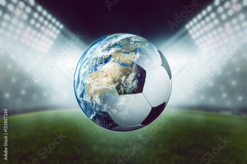 Fussball mit Welt vor Stadion photo