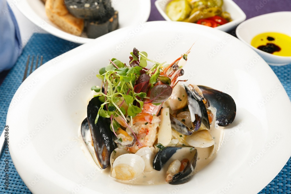 seafood cream pasta on plate seafood cream pasta on plate