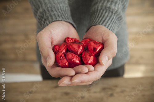 Men have plenty of chocolate in their hands