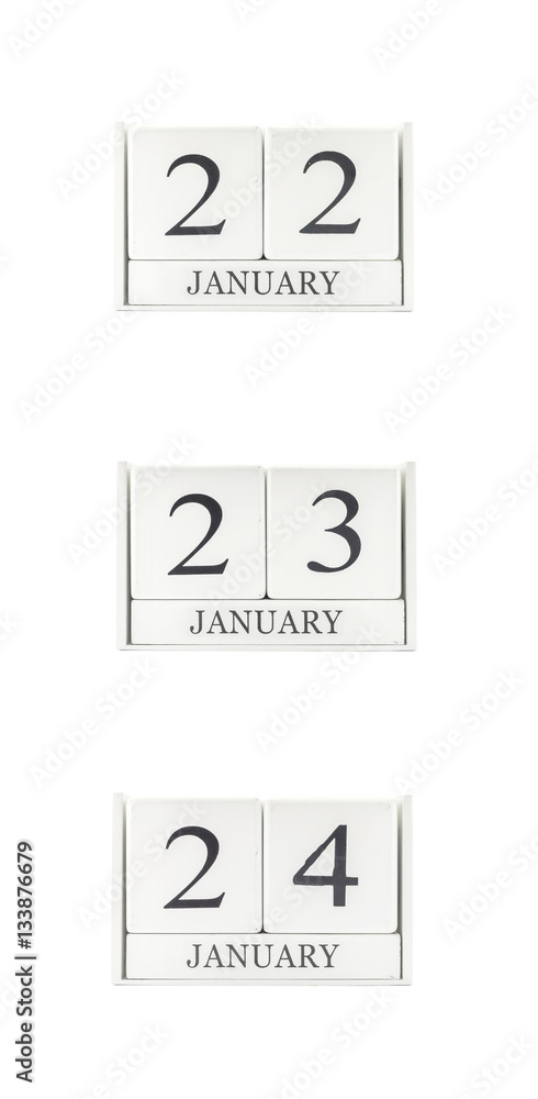 Closeup group of white wooden calendar with black 22 , 23 , 24 january word , three date calendar isolated on white background Closeup group of white wooden calendar with black 22 , 23 , 24 january word , three date calendar isolated on white background