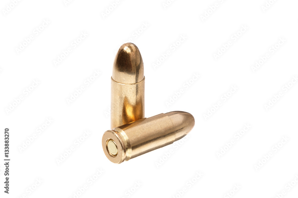 Патроны 9мм на белом фоне \ 9mm ammunition isolated Патроны 9мм на белом фоне \ 9mm ammunition isolated