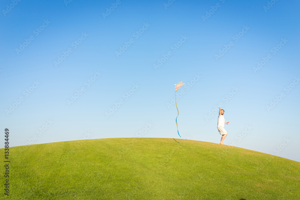 Running with kite on summer holiday vacation, perfect meadow and Running with kite on summer holiday vacation, perfect meadow and