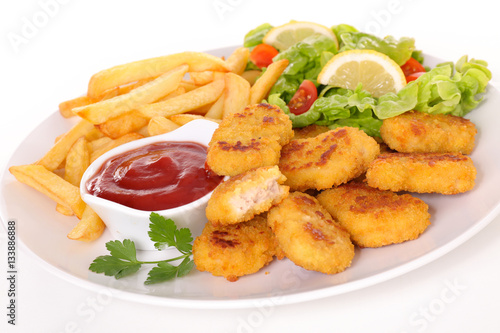 fried nugget with french fries and salad