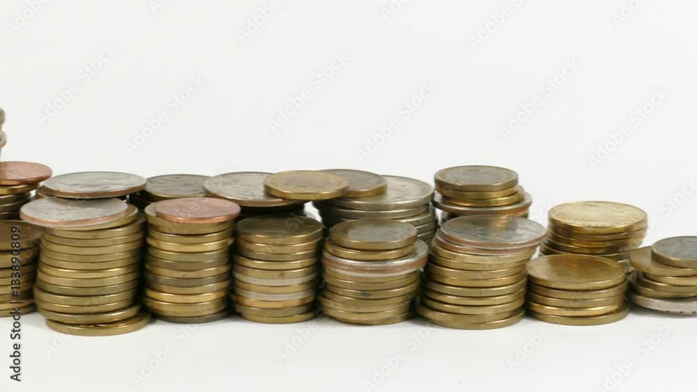 Ghana flag waving with stack of money coins Ghana flag waving with stack of money coins
