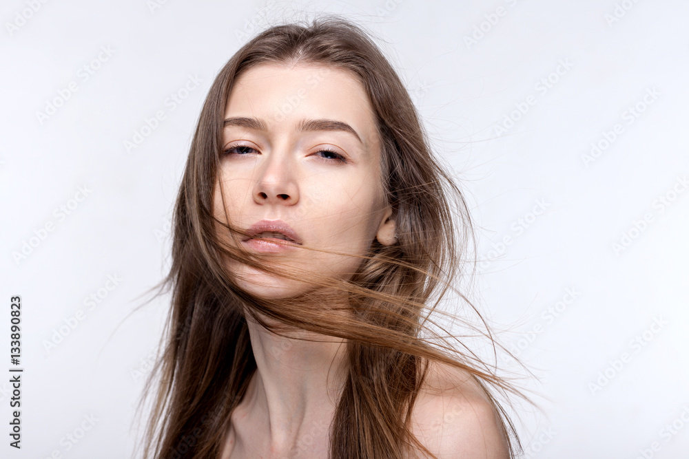 Portrait of a beautiful woman on a white background Portrait of a beautiful woman on a white background