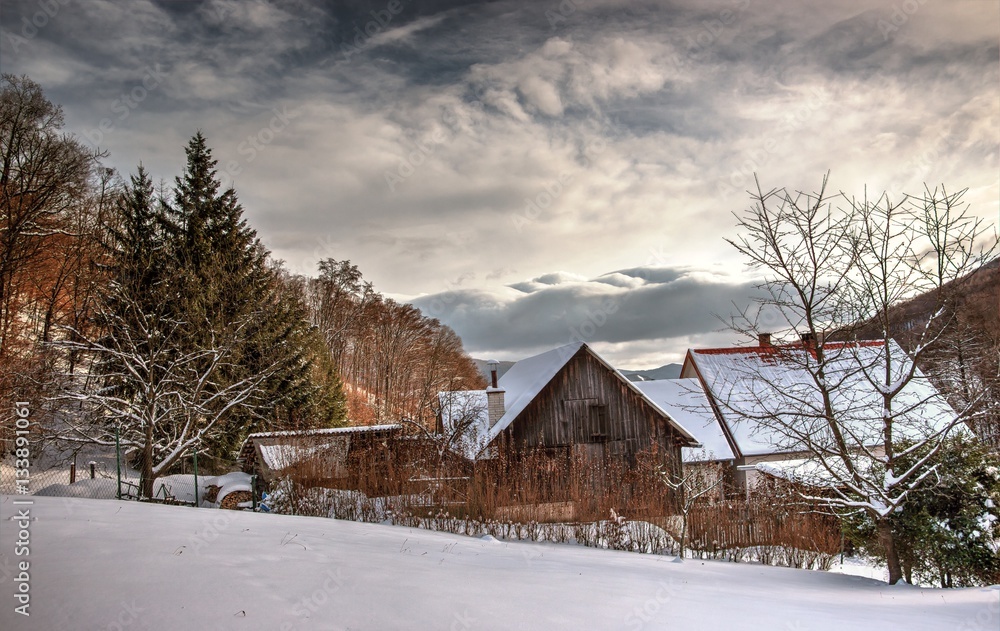 Winter Landscape and Farm House with Cloudy Sky 
