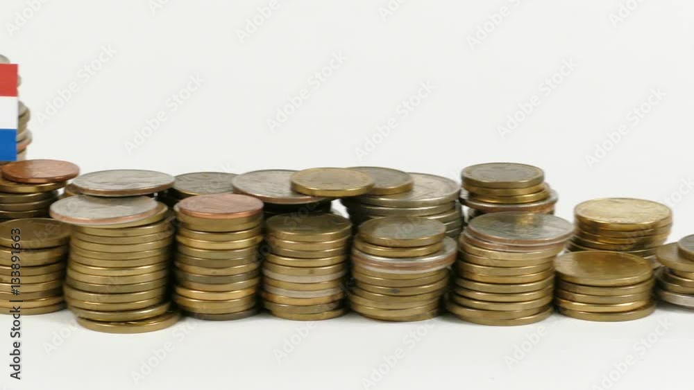 Netherlands flag waving with stack of money coins Netherlands flag waving with stack of money coins