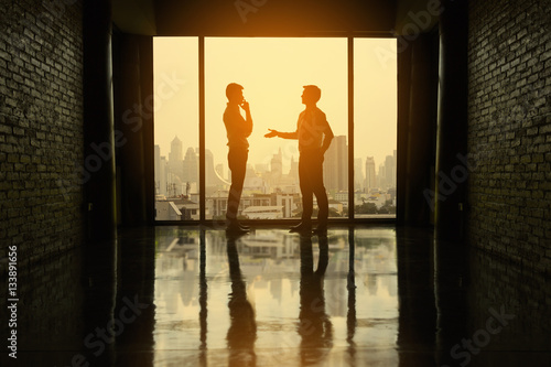 Photography Two businessmen are negotiating business in office on the building
