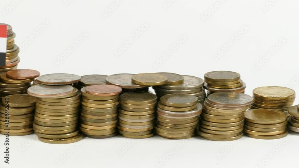 Iraq flag waving with stack of money coins Iraq flag waving with stack of money coins