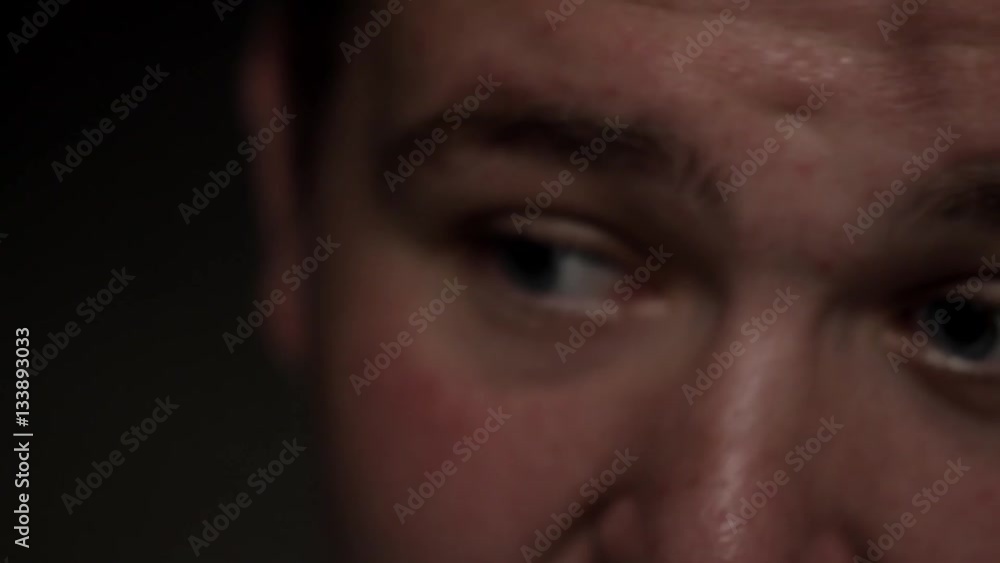 Young man seriously eyes close-up Young man seriously eyes close-up