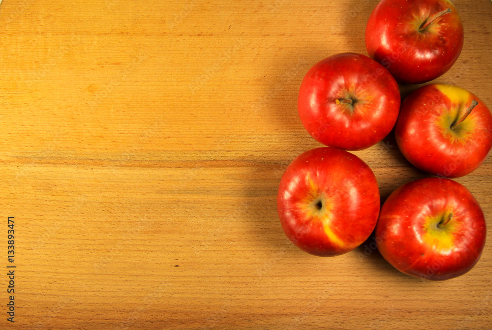 Fresh red apples on wooden background Fresh red apples on wooden background