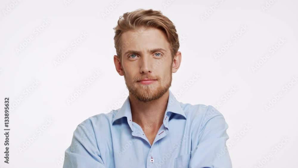 Approving Caucasian male with blue eyes and brown beard on white background Approving Caucasian male with blue eyes and brown beard on white background
