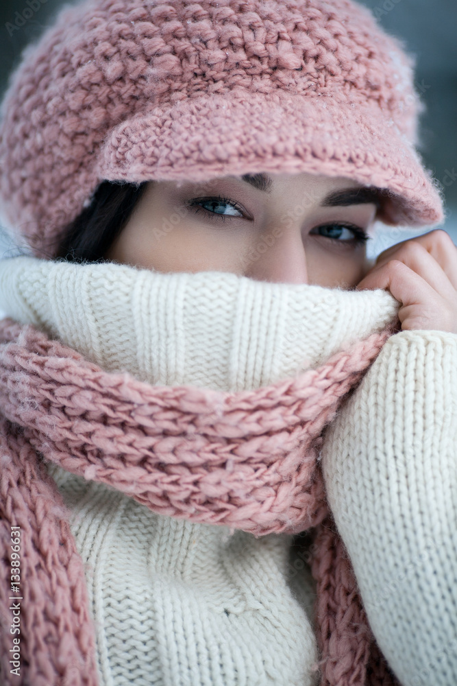 Portrait of girl in sweater, hat and scarf. Portrait of girl in sweater, hat and scarf.