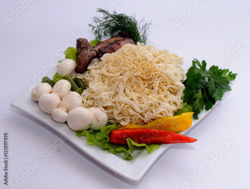 Instant noodles with meat, mushrooms and vegetables