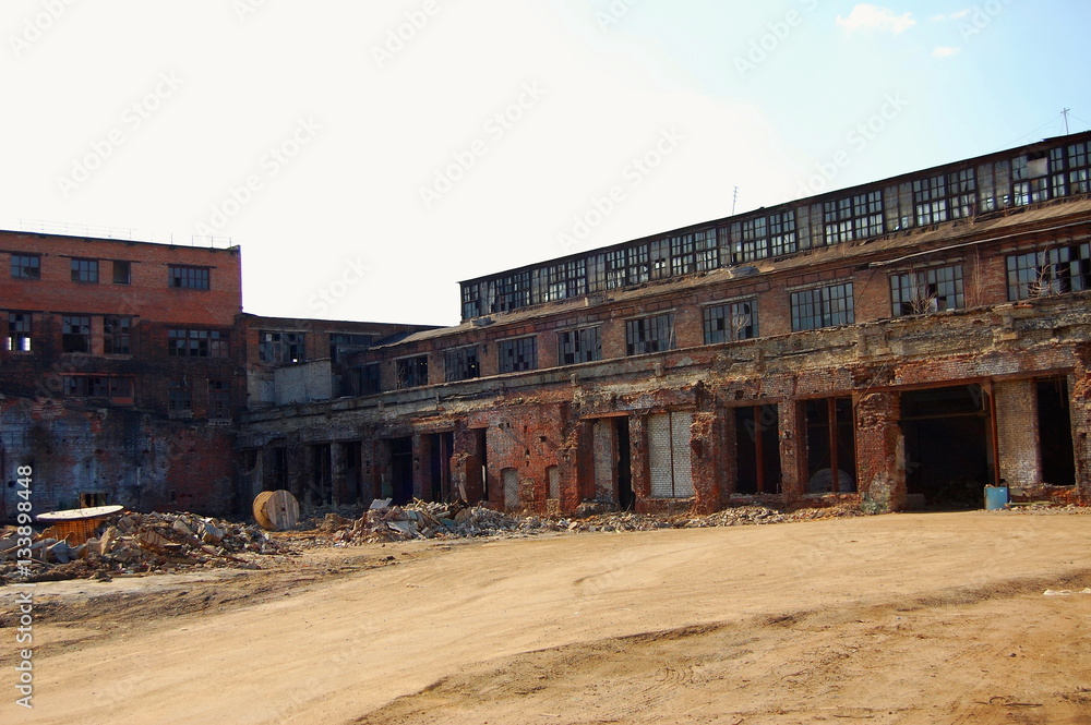 The destruction of the old factory building.