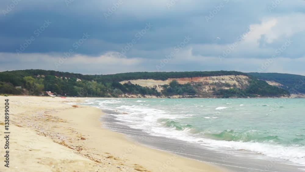 Seascape. Thunderclouds. Raging sea. Deserted beach Seascape. Thunderclouds. Raging sea. Deserted beach