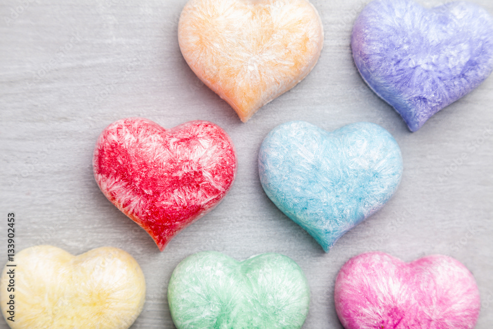Love concept. Colorful hearts on grey background Love concept. Colorful hearts on grey background