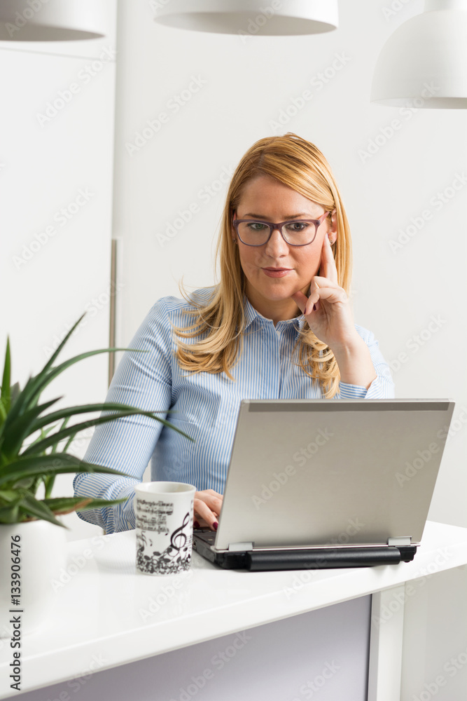 Young businesswoman working at home Young businesswoman working at home
