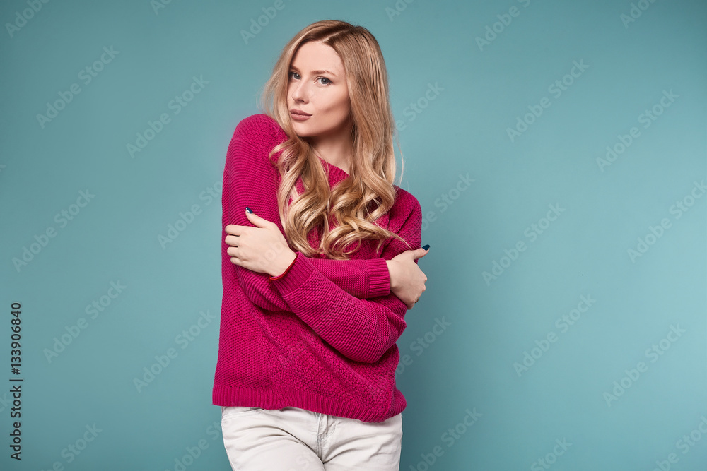 Beautiful cute blond woman in purple sweater Beautiful cute blond woman in purple sweater