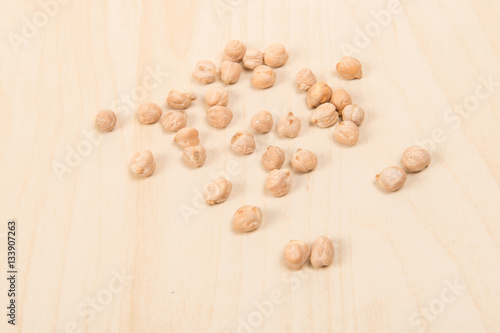 Chick peas on a wooden background