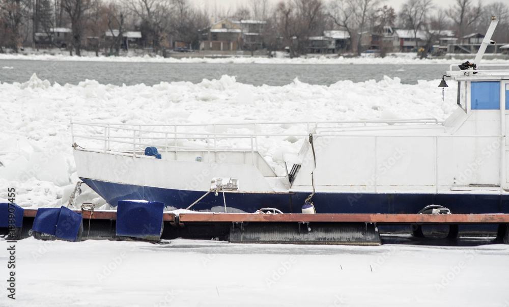 Trapped boat and birds in frozen Danube river Trapped boat and birds in frozen Danube river