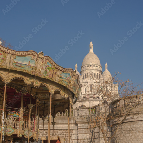 Paris, basilica Sacre-Coeur with a merry go round