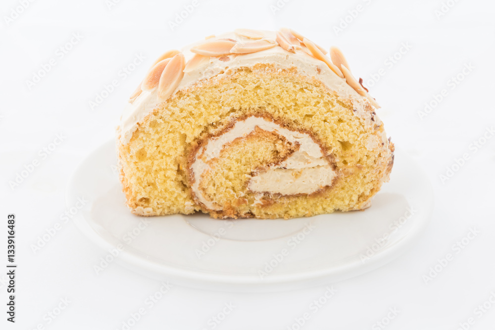 Almond roll cake on white dish
