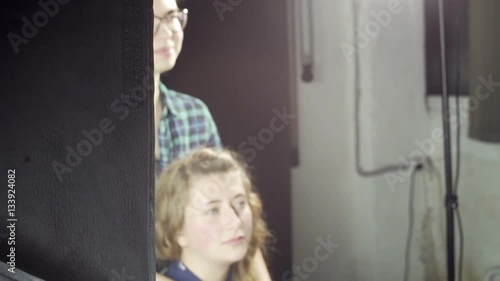 Wallpaper Mural Two young girls at photosession unfocus Torontodigital.ca