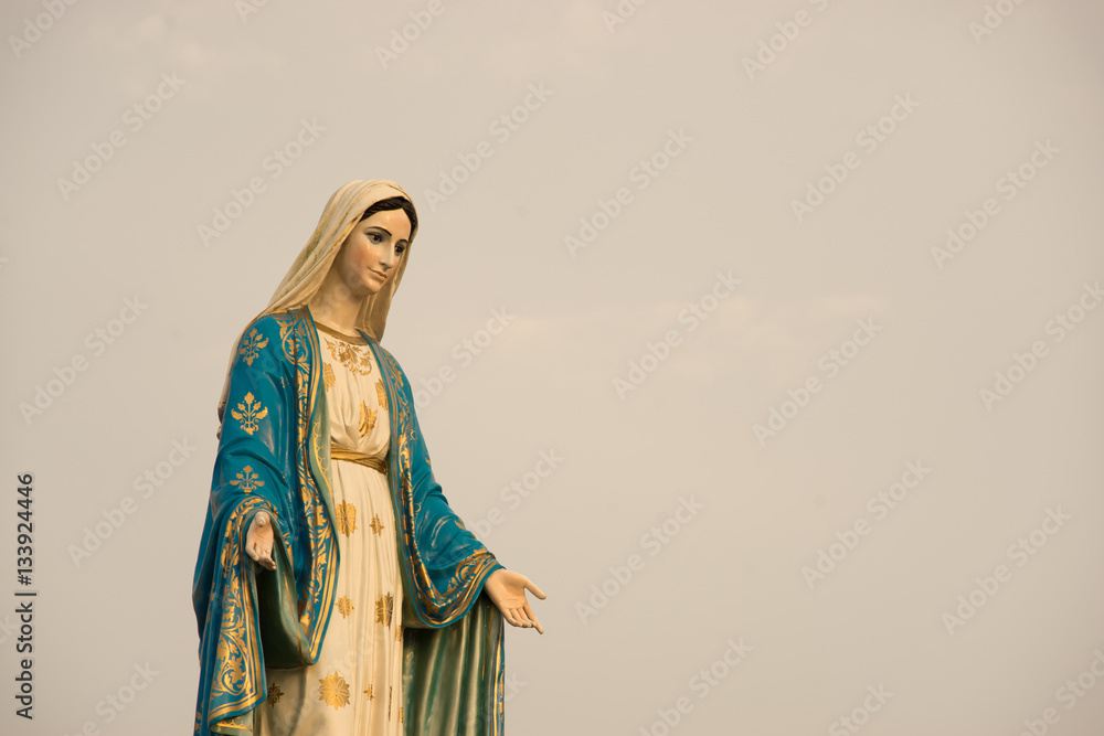 Fototapeta premium Virgin mary statue warm tone