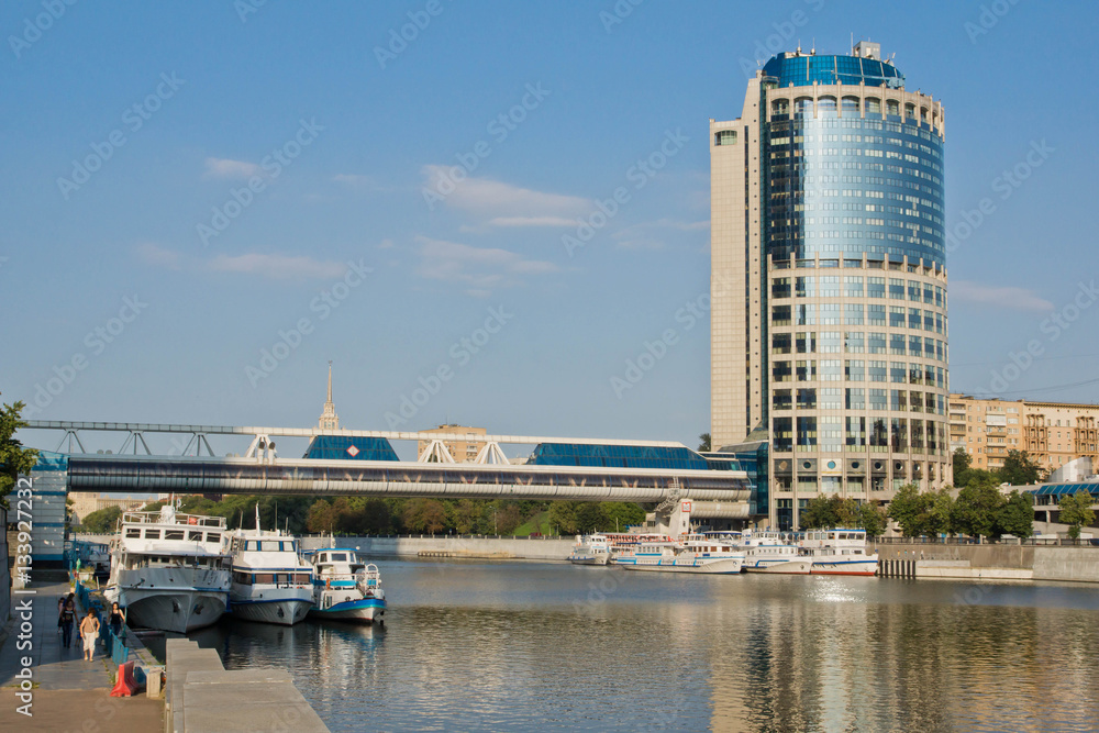 glass house on river bank in summer