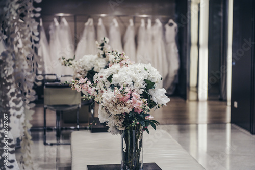 Obraz na plátně Luxury clothing shop with wedding dresses