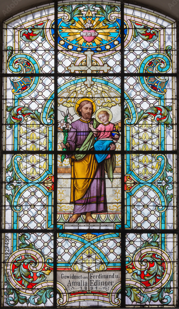VIENNA, AUSTRIA - DECEMBER 19, 2016: The St. Joseph on the stained glass of church Mariahilfer Kirche by prof. Rudolf Geyling (1897) in workroom Carl Geylings Erben.