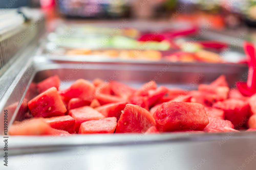 Watermelon buffet salad bar self serve with scoop Watermelon buffet salad bar self serve with scoop